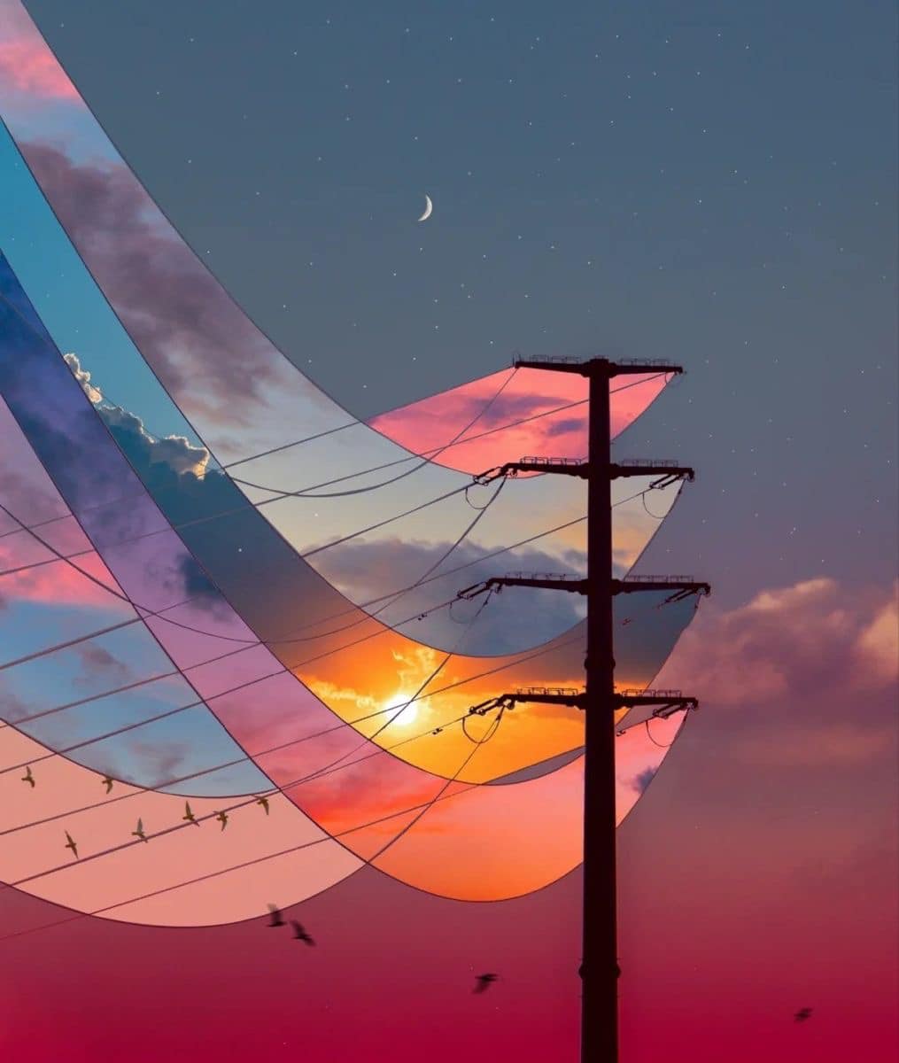This meme is a picture of a sunset with a power pole in the foreground. The image is edited to look like a bird's wings are emerging from the pole, with the sun and clouds forming the shape of a bird's body. The text "I can see for miles and miles" is written in a playful, childlike font at the top of the image.